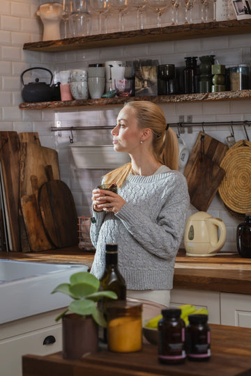 Pregnant woman with glass